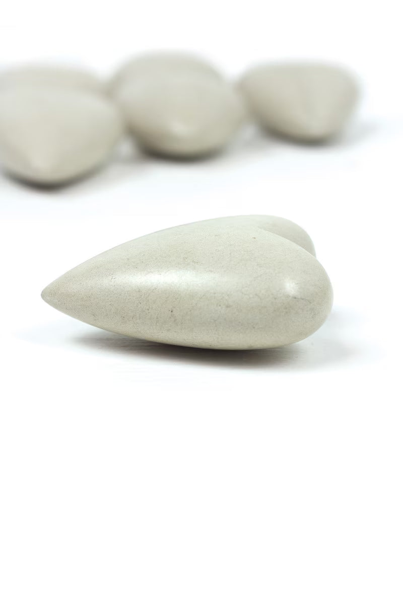 SET OF SIX HAND CARVED STONE HEARTS- WHITE