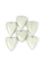SET OF SIX HAND CARVED STONE HEARTS- WHITE