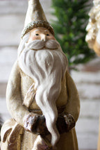 SET OF TWO RESIN SANTAS