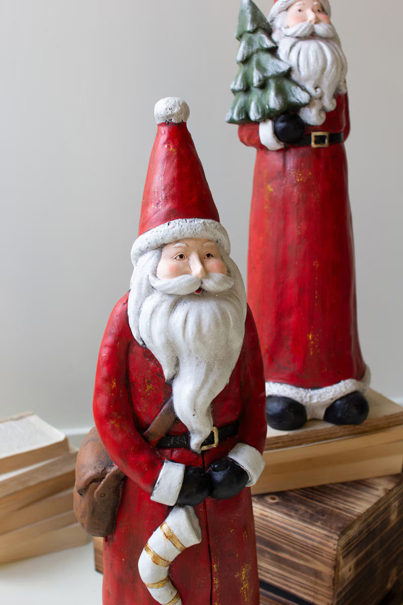 SET OF TWO RESIN SANTAS
