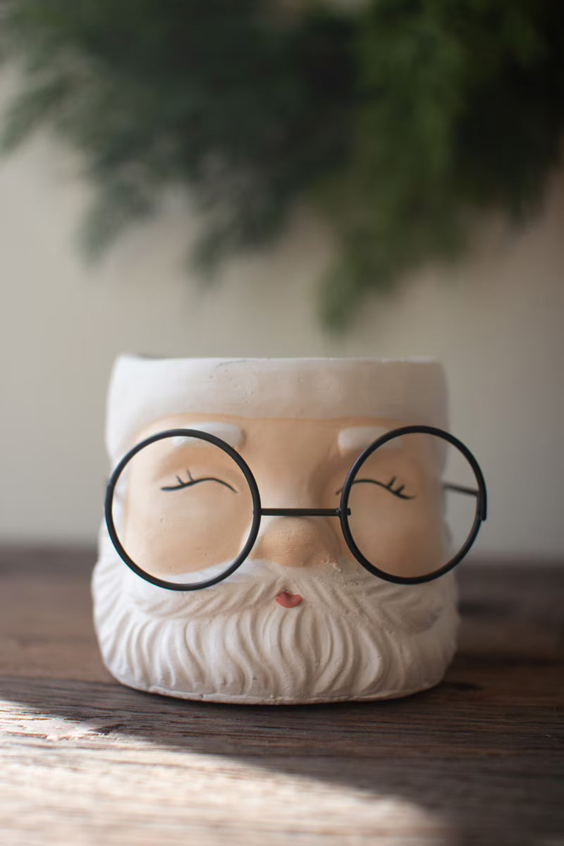 SET OF TWO CONCRETE SANTA PLANTERS