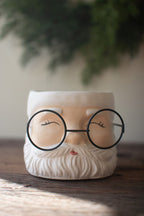SET OF TWO CONCRETE SANTA PLANTERS