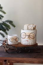 SET OF TWO CONCRETE SANTA PLANTERS