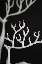 SET OF TWO WHITE CAST IRON DEER
