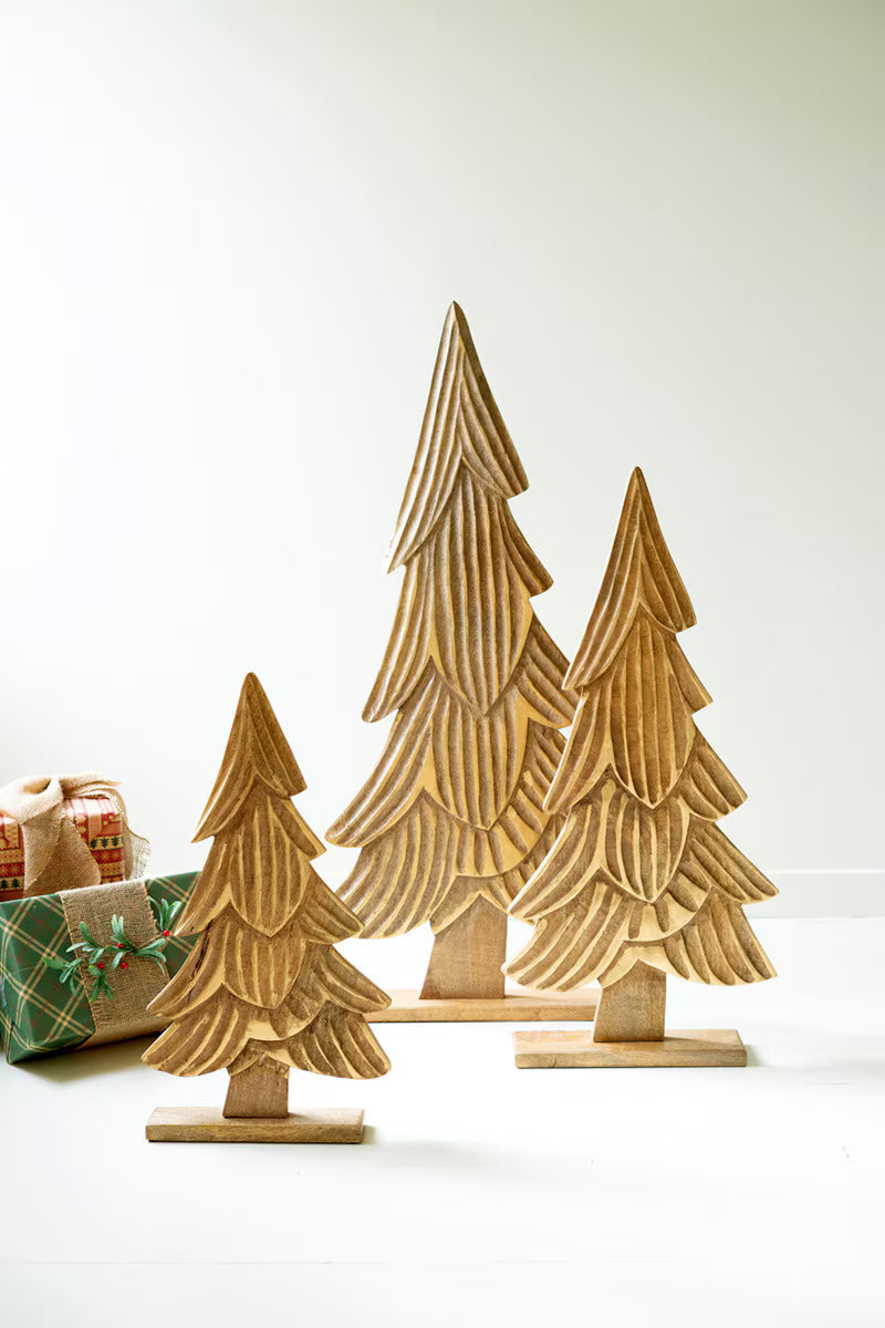 SET OF THREE CARVED WOODEN CHRISTMAS TREES ON BASES