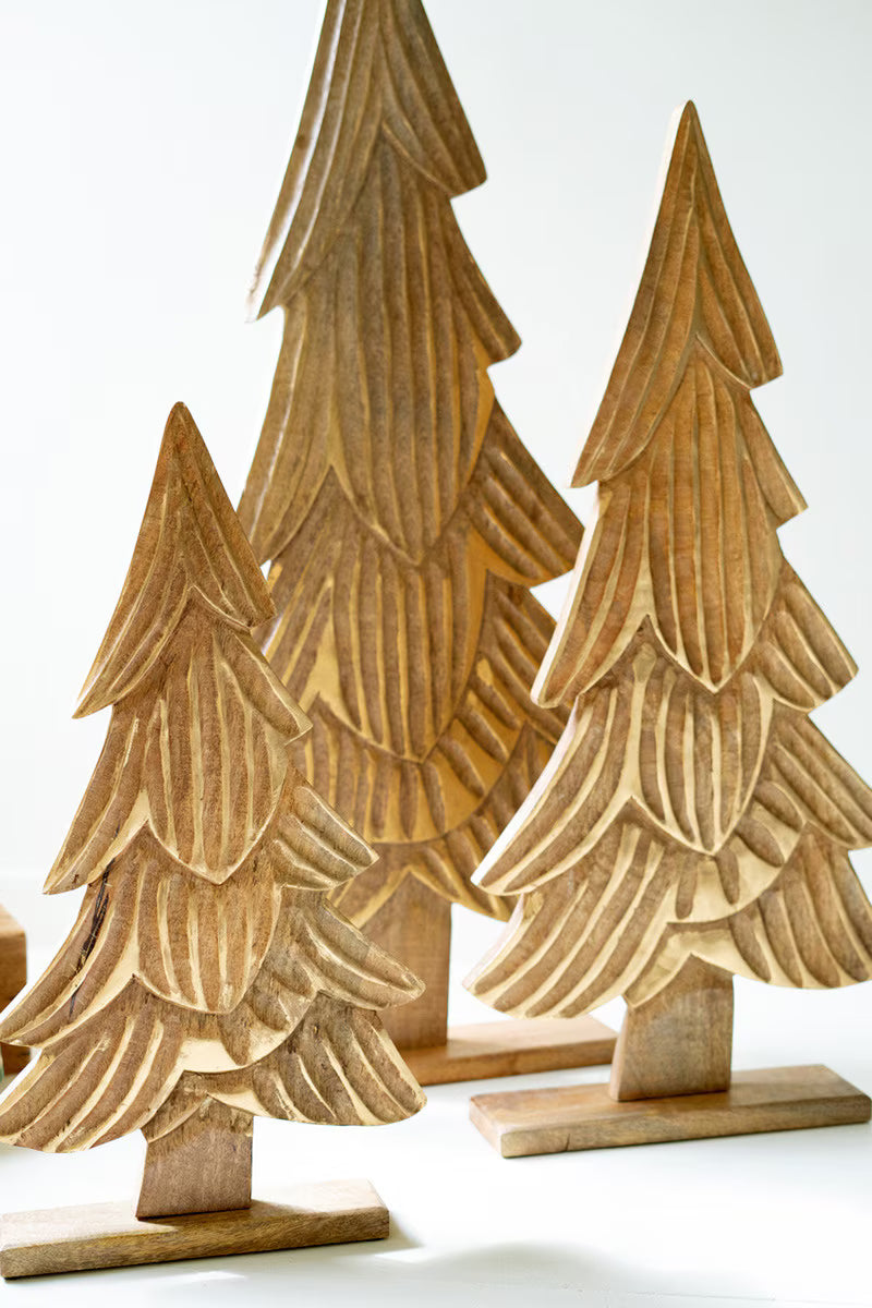 SET OF THREE CARVED WOODEN CHRISTMAS TREES ON BASES