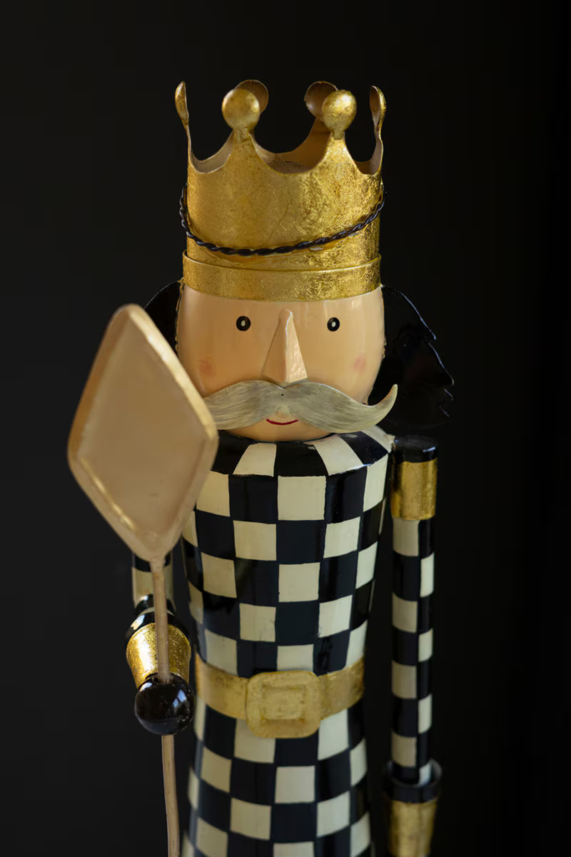 SET OF TWO PAINTED METAL AND WOOD CHECKERBOARD NUTCRACKERS