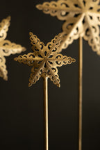SET OF THREE METAL STARS ON MARBLE BASES