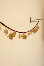CHRISTMAS CHARM GARLAND WITH MAROON VELVET RIBBON